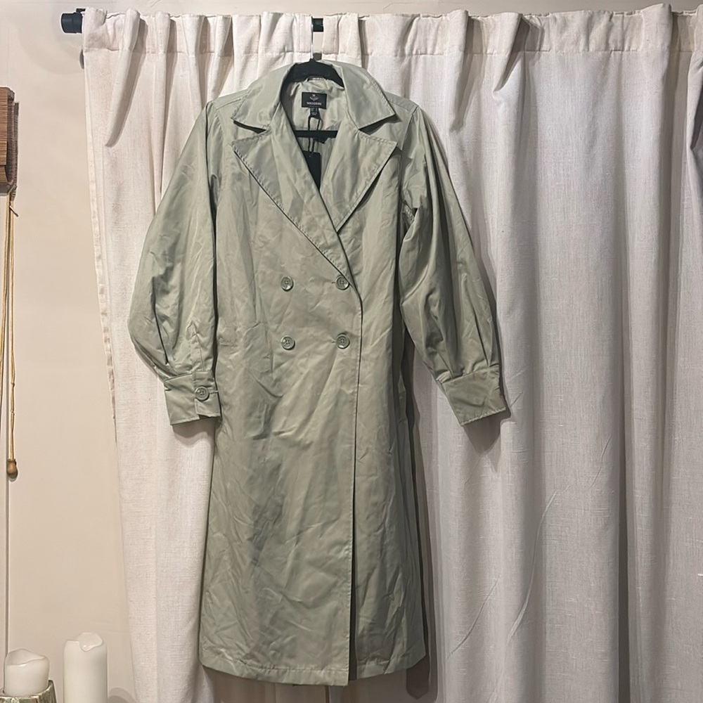 Threadbare trench coat
